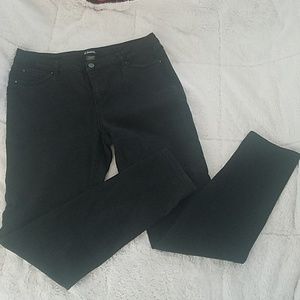 Mid-rise black stretch skinny/ankle jeans